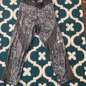 Grey and white Nike Pro Crops